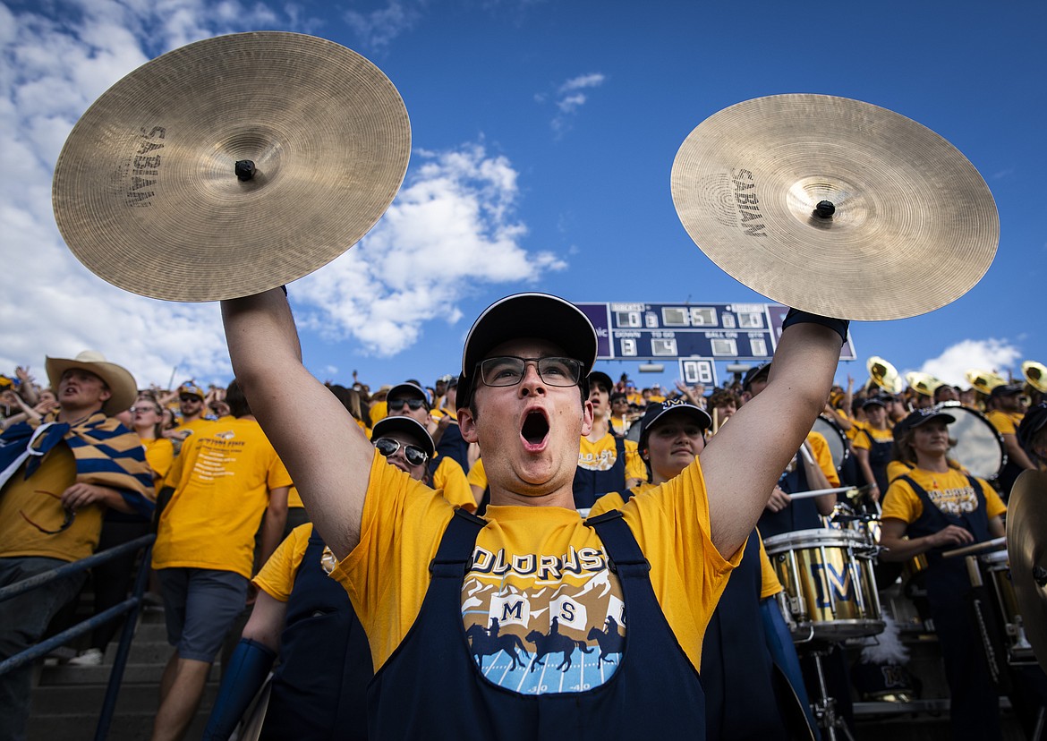 Hugh Frampton, cymbals, and the rest of the marching band bring energy and spirit to Bobcat football games and other university events. (MSU photo by Colter Peterson)