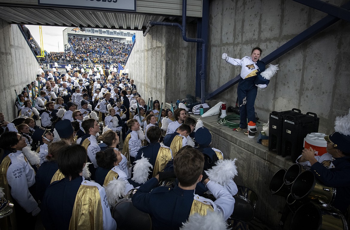 Trumpet player Hailey Finch leads the Spirit of the West marching band in a pre-performance rally cry. (MSU photo by Colter Peterson)