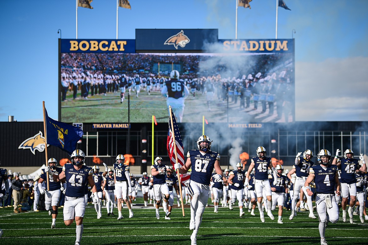 The Montana State Bobcats take the field before the 123rd Brawl of the Wild with the Montana Grizzlies at Bobcat Stadium on Saturday, Nov. 23. (Casey Kreider/Daily Inter Lake)