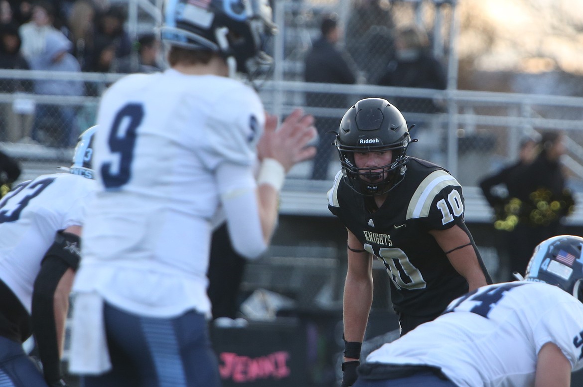 Royal senior Ben Jenks (10) keeps his eyes on the quarterback before a play in Saturday’s quarterfinal game against Lynden Christian. Jenks returned an interception for a touchdown in the win.