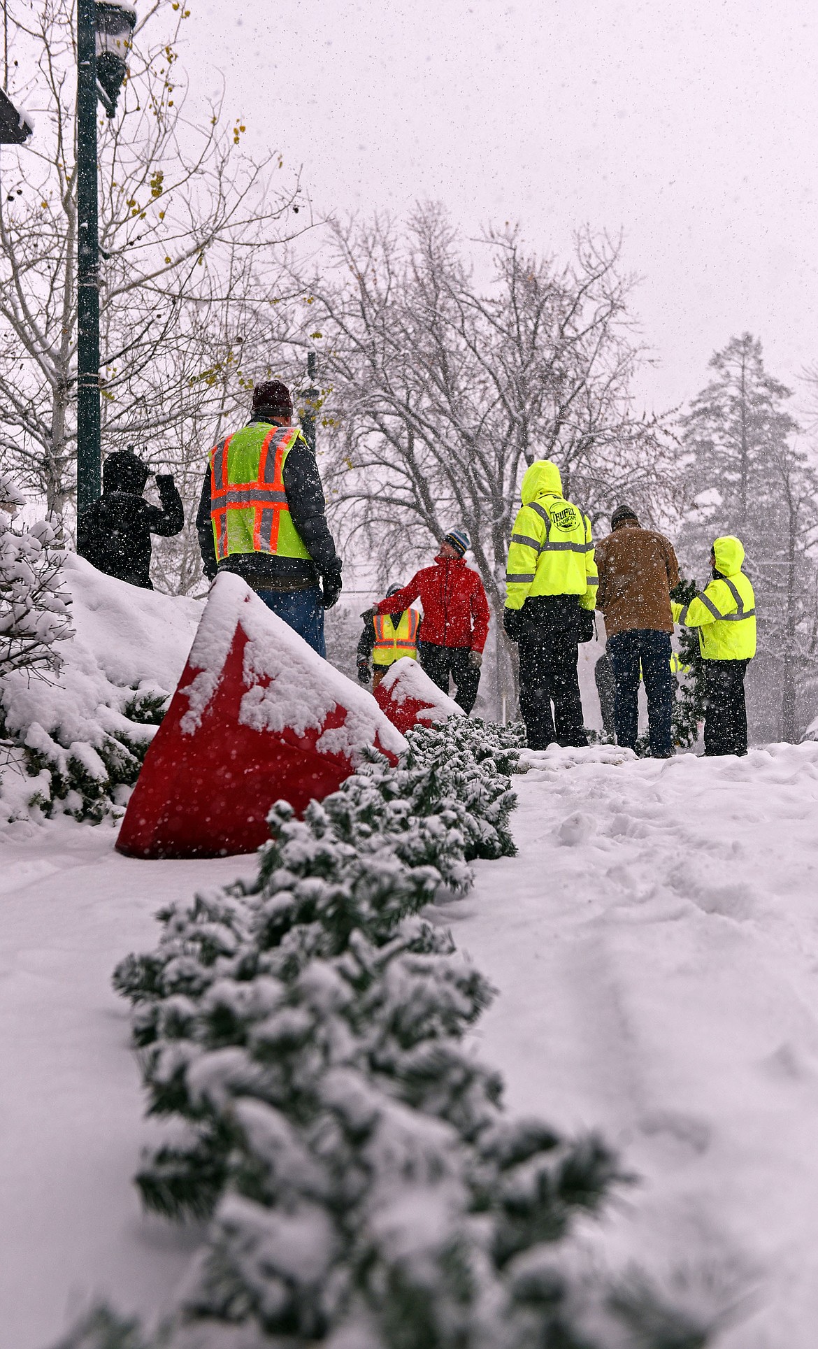 Whitefish's winter decorations were installed Sunday, Nov. 24, with help from several volunteers. (Julie Engler/Whitefish Pilot)