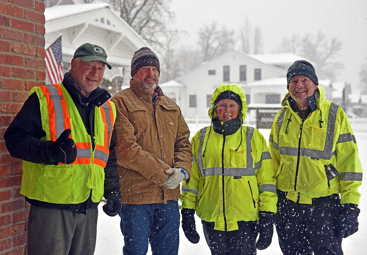 Whitefish's winter decorations were installed Sunday, Nov. 24, with help from several volunteers. (Julie Engler/Whitefish Pilot)