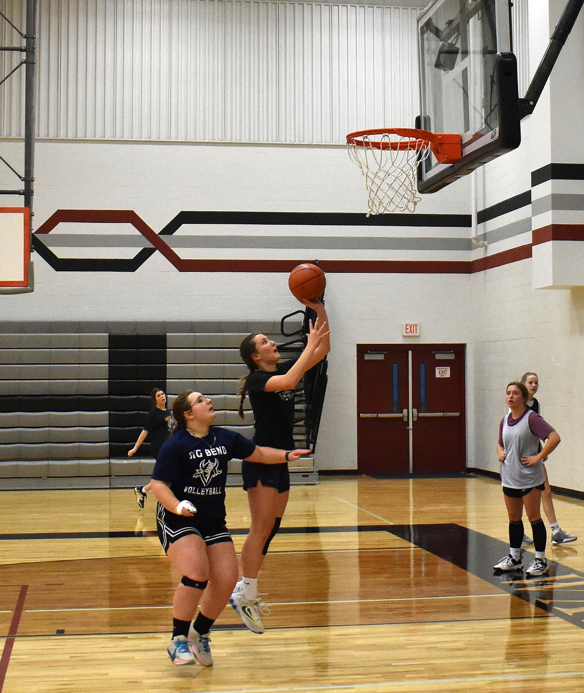 Josie Bayless takes a left-handed shot at the Almira/Coulee-Hartline Warriors’ practice Nov. 20.