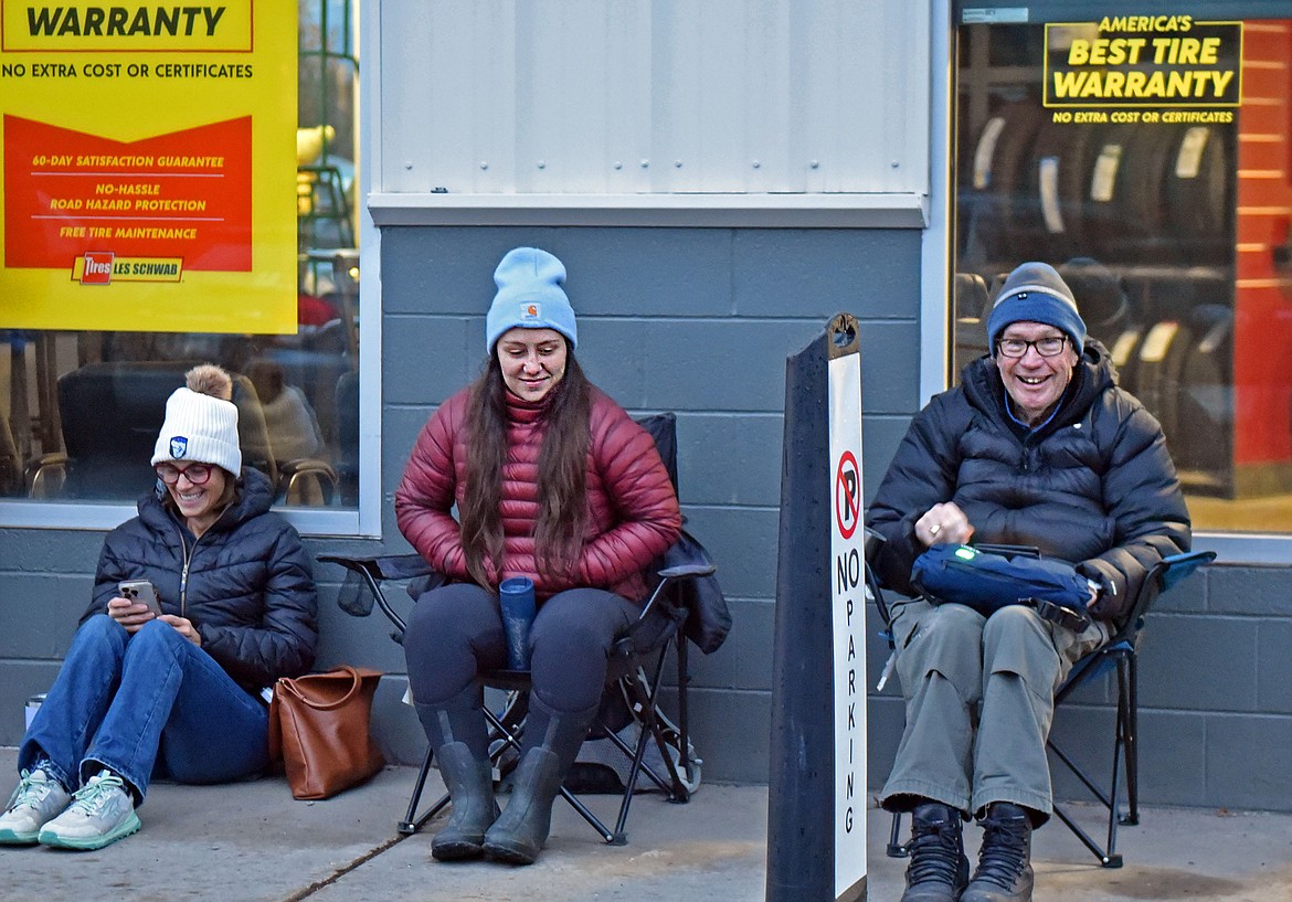 The first three customers in line for a seasonal tire change at Les Schwab in Whitefish last Friday morning. (Julie Engler/Whitefish Pilot)