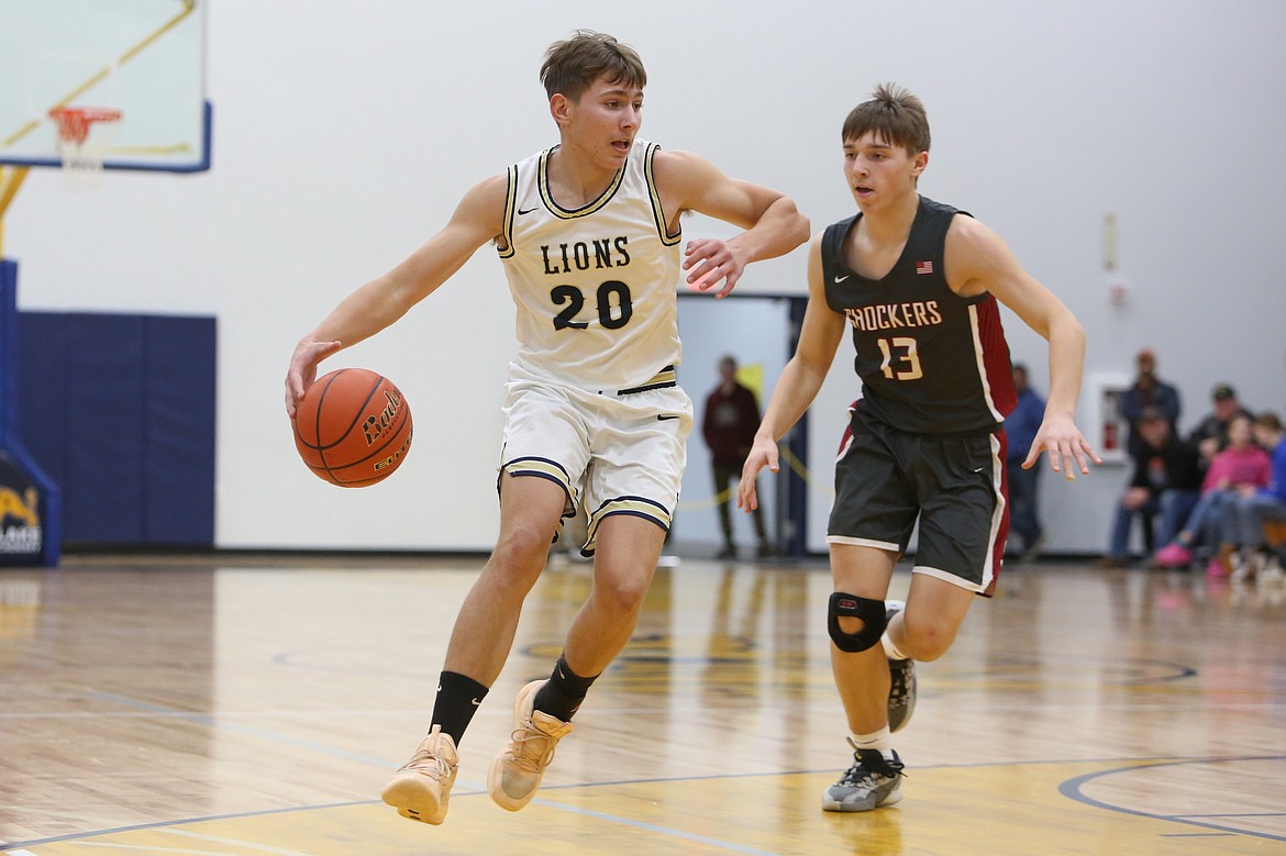 MLCA/CCS sophomore Max Gulenko (20) evades a Waterville-Mansfield defender during the Central Washington B district tournament last season. Head Coach Emerson Ferguson said he expects Gulenko to step into a bigger role this season.