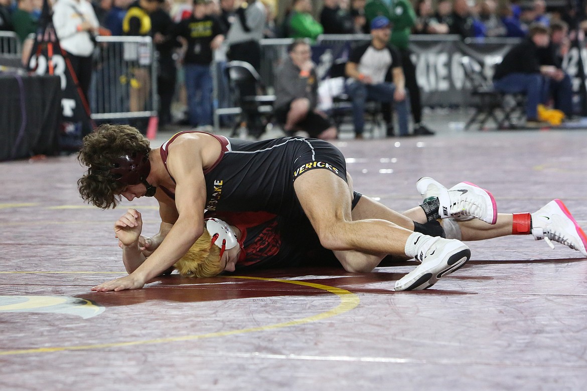 Moses Lake senior Drayden Gaither, top, wrestles at the state tournament in Tacoma last season. Head Coach Jose Tanguma said Gaither has stepped up as a leader in the wrestling room this season.