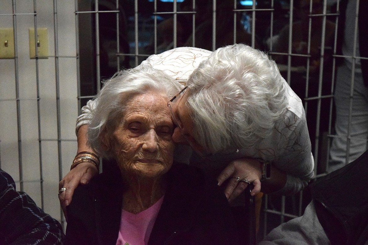 Geneva Scott is welcomed by Chrystal Scott, her granddaughter-in-law at her 109th birthday party on Sunday.