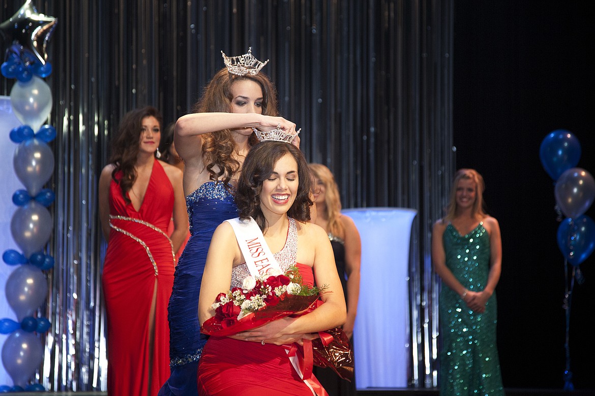 Miss East Cascades 2012 Connie Morgan crowns 2013 winner Lacey Ebert.