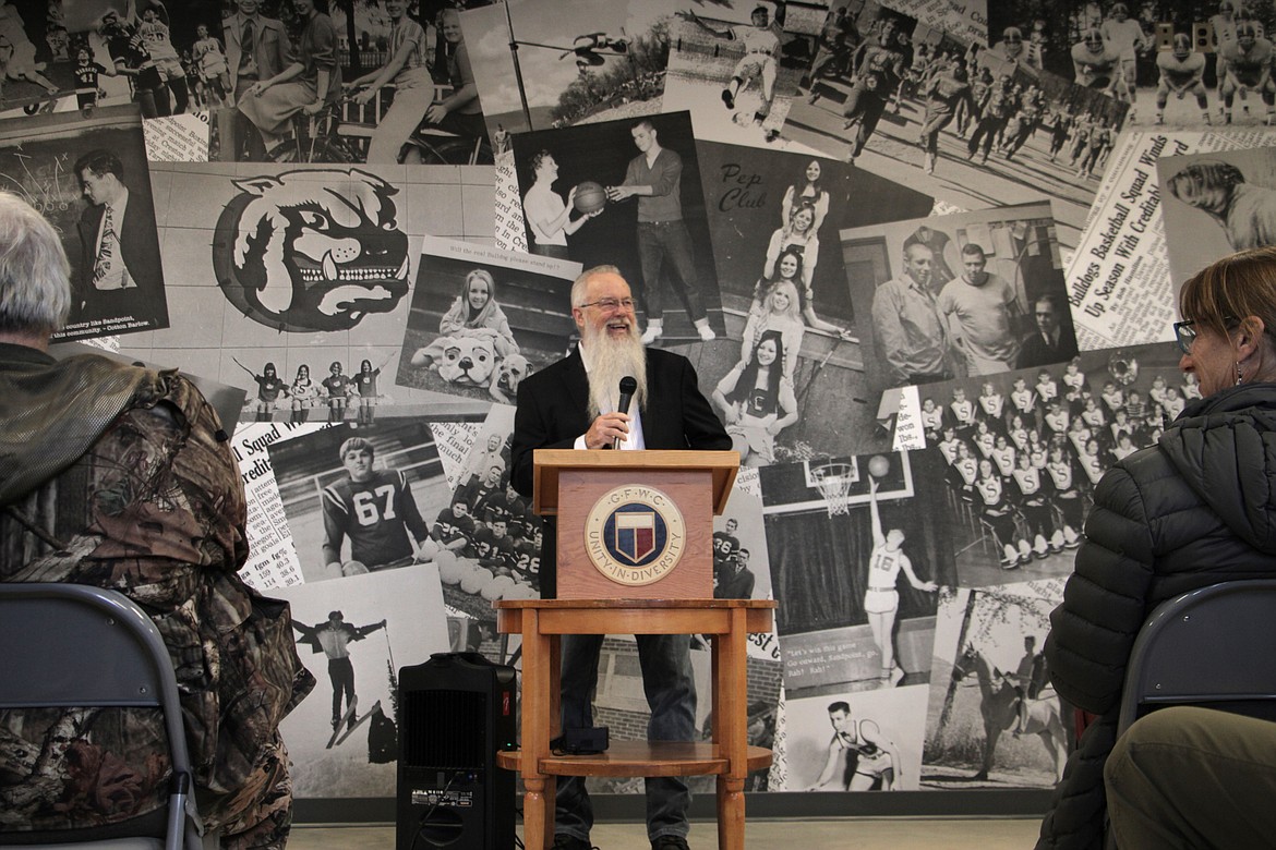 Jim Russell, who with his mother Ginny Russell donated $7.5 million to enable the construction of the James E. Russell Sports Center, speaks during the facility's dedication.