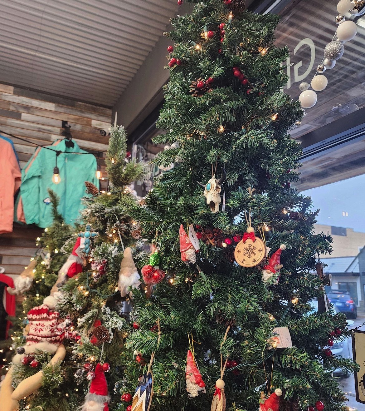 Christmas trees, like this one at Second Nature in Polson, are decked out for Small Business Saturday. (Berl Tiskus/Leader)