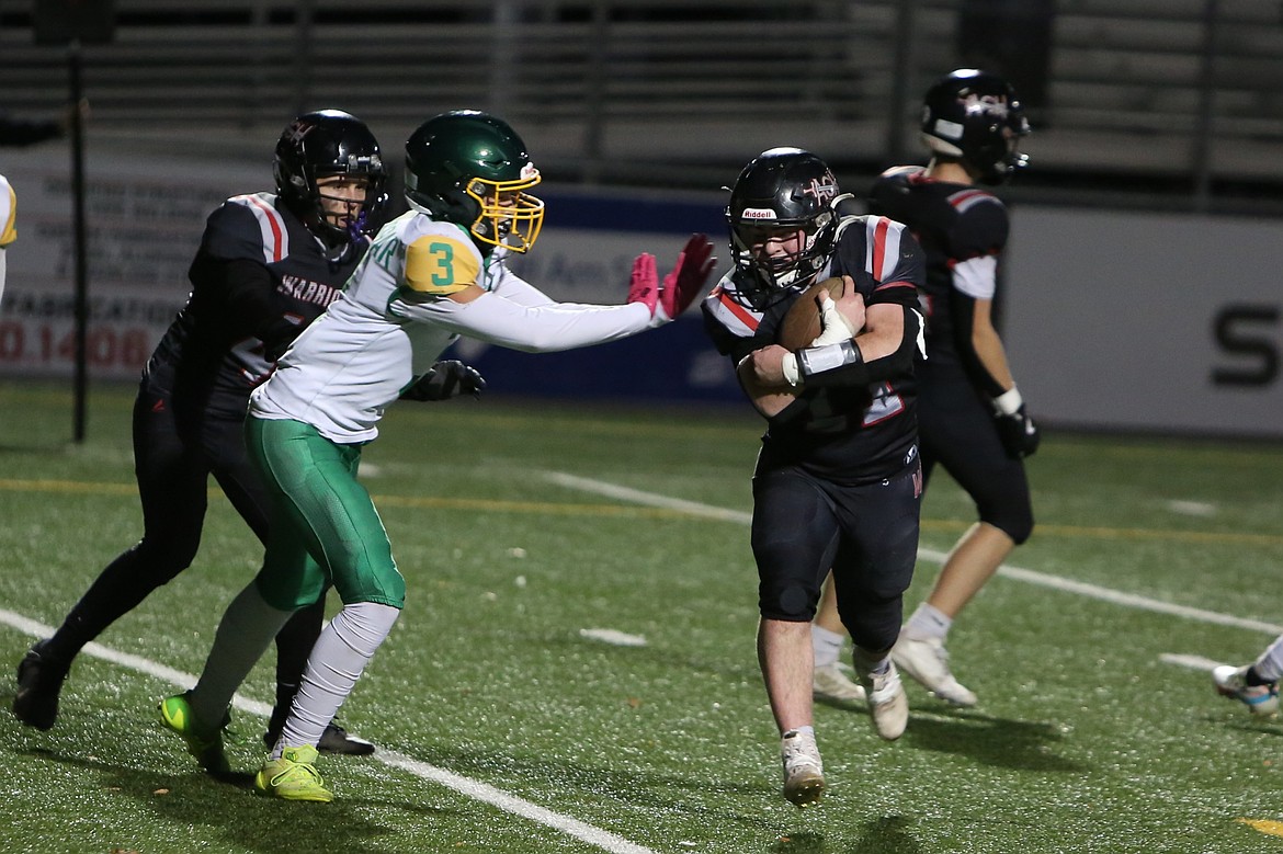 Almira/Coulee-Hartline senior Carter Pitts, right, runs the ball into the end zone for a two-point conversion against Inchelium on Nov. 15. The Warriors play No. 1 Liberty Christian on Saturday; the two teams met in a Sept. 20 game, where Pitts ran for 221 yards and two touchdowns.