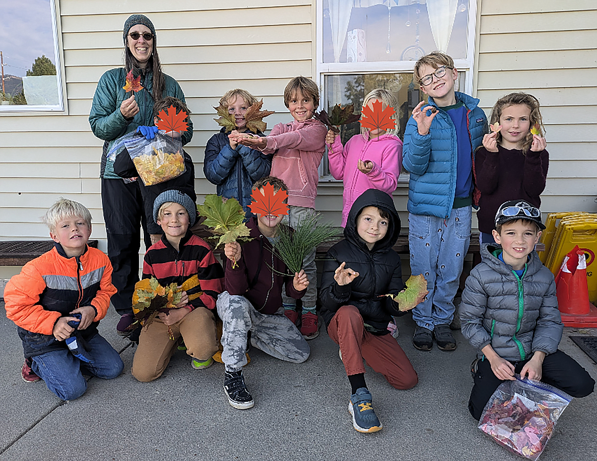 Sandpoint Waldorf second graders are pictured after gathering leaves for lantern making.