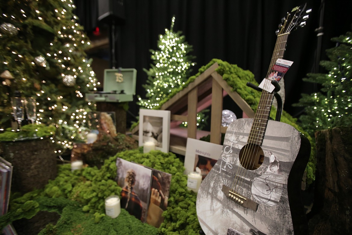 A guitar signed by Taylor Swift is among the treasures to be found in the displays at the Kootenai Health Foundation's Festival of Trees, which opened Friday in The Coeur d'Alene Resort with the Friday d'Lights event and continues tonight with the Festival Gala.