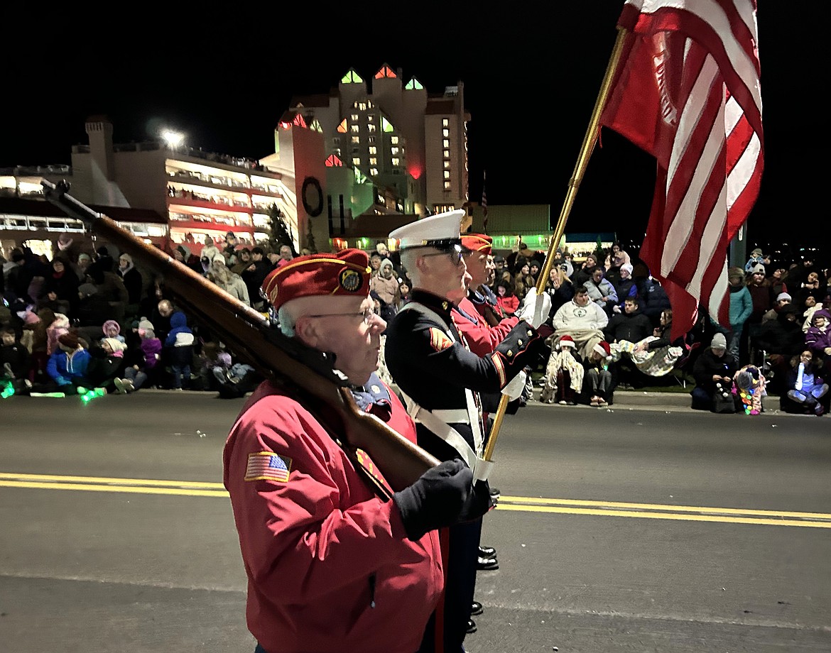 The Color Guard pauses during Friday's parade as they pass in front of The Coeur d'Alene Resort.