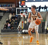 COLLEGE MEN'S BASKETBALL: Mitchell powers Vandals past UC Riverside