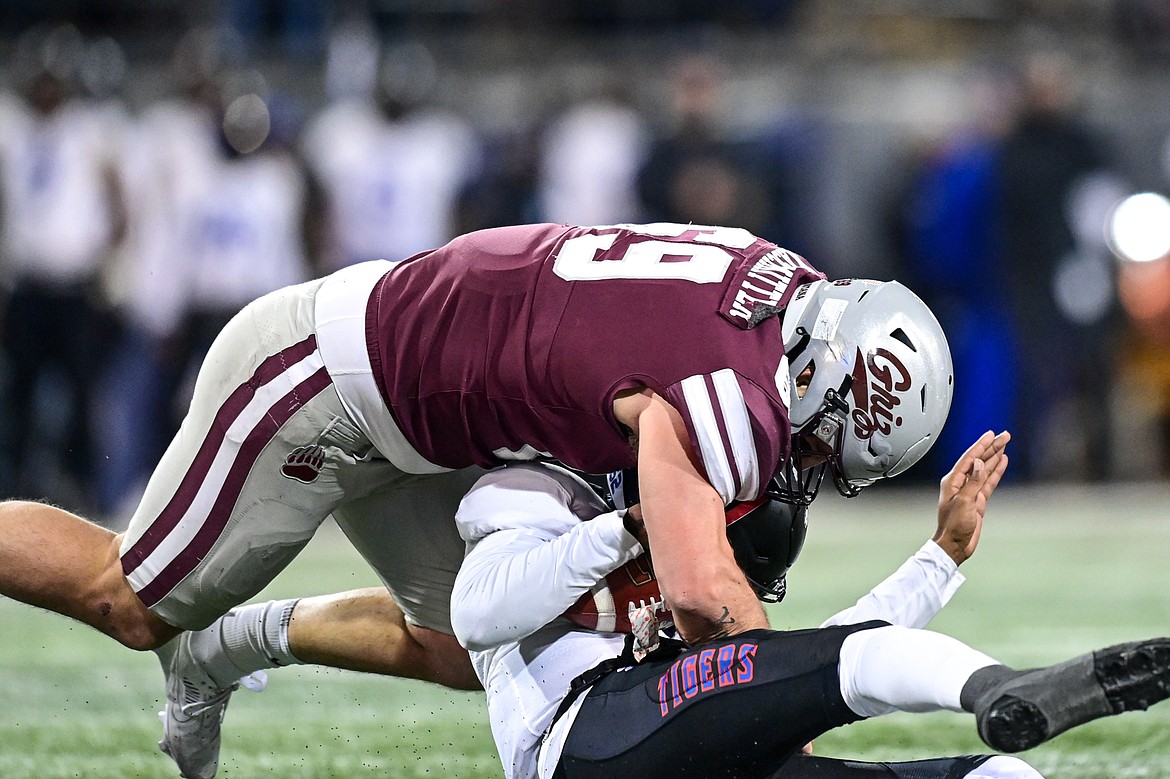 Grizzlies defensive lineman Noah Kaschmitter (69) sacks Tennessee State quarterback Draylin Ellis (1) in the third quarter of the opening round of the FCS Playoffs at Washington-Grizzly Stadium on Saturday, Nov. 30. (Casey Kreider/Daily Inter Lake)