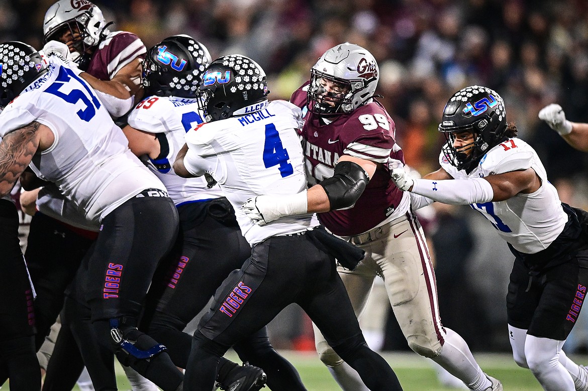 Grizzlies defensive tackle Patrick Hayden (99) stops Tennessee State running back Jaden McGill (4) in the backfield in the first round of the FCS Playoffs at Washington-Grizzly Stadium on Saturday, Nov. 30. (Casey Kreider/Daily Inter Lake)