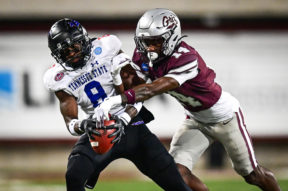 Grizzlies cornerback Kyon Loud (14) defends a pass to Tennessee State wide receiver Jalal Dean (8) in the first round of the FCS Playoffs at Washington-Grizzly Stadium on Saturday, Nov. 30. (Casey Kreider/Daily Inter Lake)