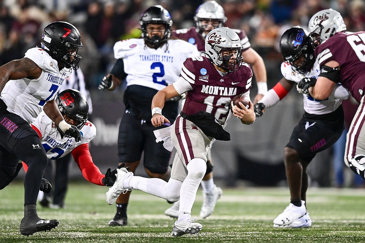 Grizzlies quarterback Logan Fife (12) scrambles for a gain in the second quarter against Tennessee State at Washington-Grizzly Stadium on Saturday, Nov. 30. (Casey Kreider/Daily Inter Lake)