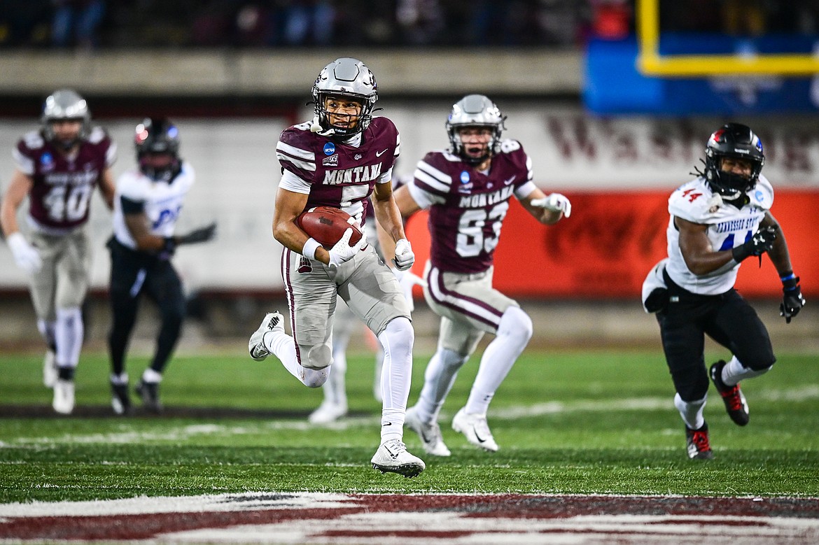 Grizzlies returner Junior Bergen (5) returns a punt 52-yards for a touchdown in the third quarter against Tennessee State in the first round of the FCS Playoffs at Washington-Grizzly Stadium on Saturday, Nov. 30. (Casey Kreider/Daily Inter Lake)