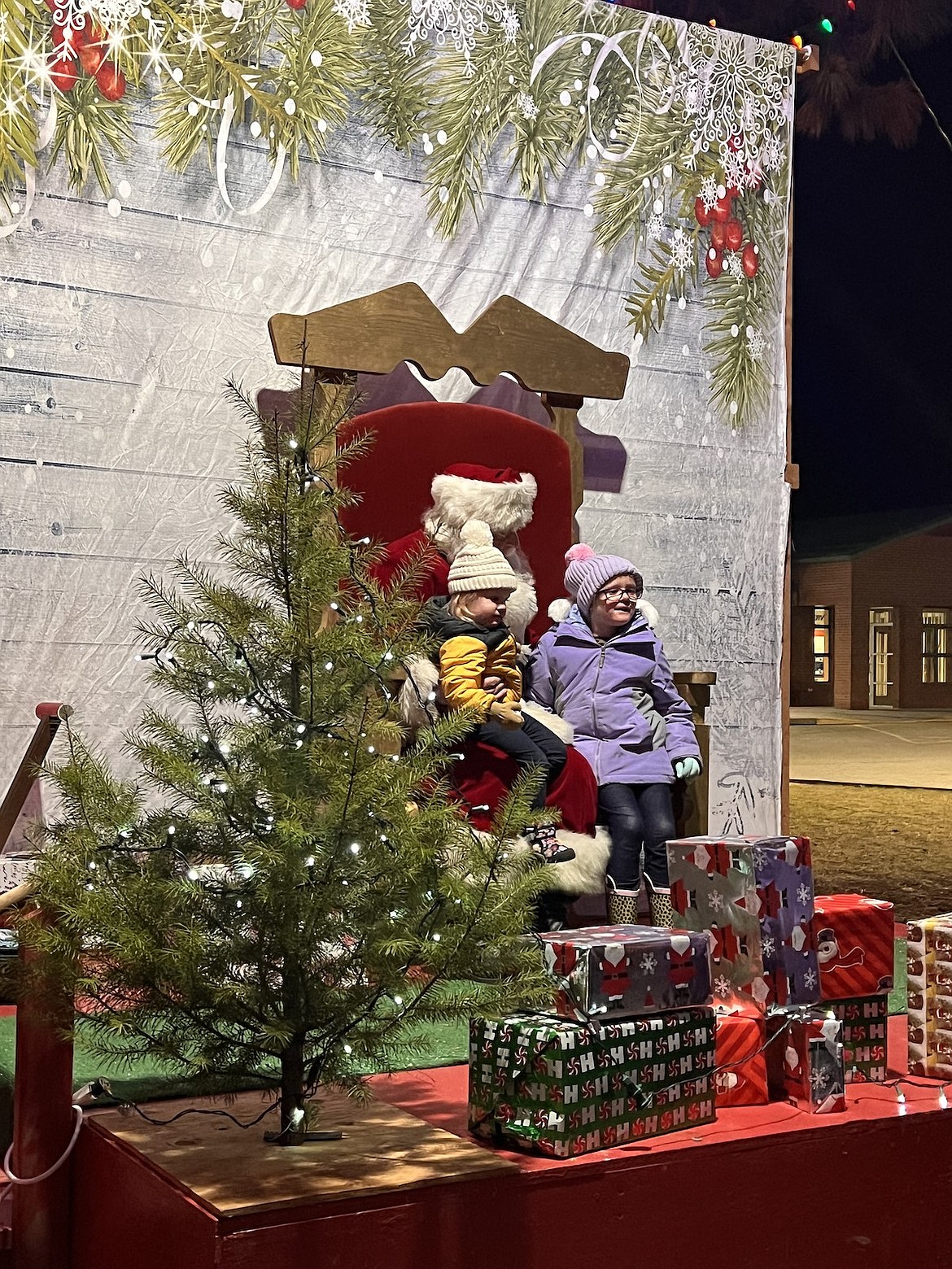 The kids got to tell Santa Claus what's on their wish list at Troy's annual Christmas tree lighting event Saturday, Dec. 1, 2024. (Taylor Resch/The Western News)