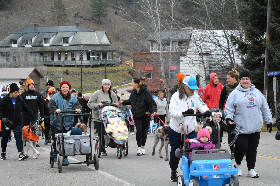 The Mineral County Turkey Trot 5K, hosted by the Mineral County Rec club had a simple motto: Run now, gobble later. Participants were encouraged to run, gallop, skip, walk or jog the event. Many families were present with strollers, buggies and wagons. The first-place winner of the 5K was Silas Acker, followed by his mom, Laura Acker, taking second. (Mineral Independent/Amy Quinlivan)