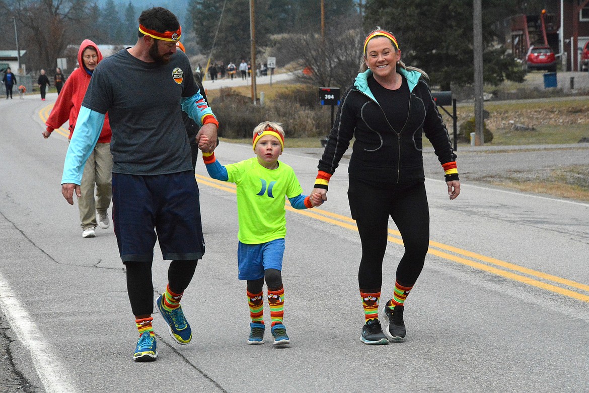 This family rocked some brightly colored Thanksgiving themed turkey socks and sweat bands. (Mineral Independent/Amy Quinlivan)