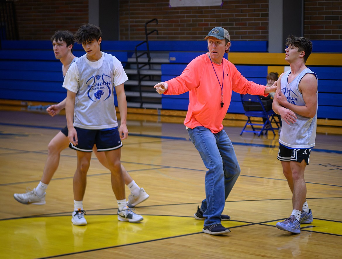 Thompson Falls head coach Jake Mickelson works with guard Kaiden Robins during preseason practice this past week as the Blue Hawks prepare for their season opener this Friday versus Florence in Thompson Falls. (Photo by Tracy Scott)