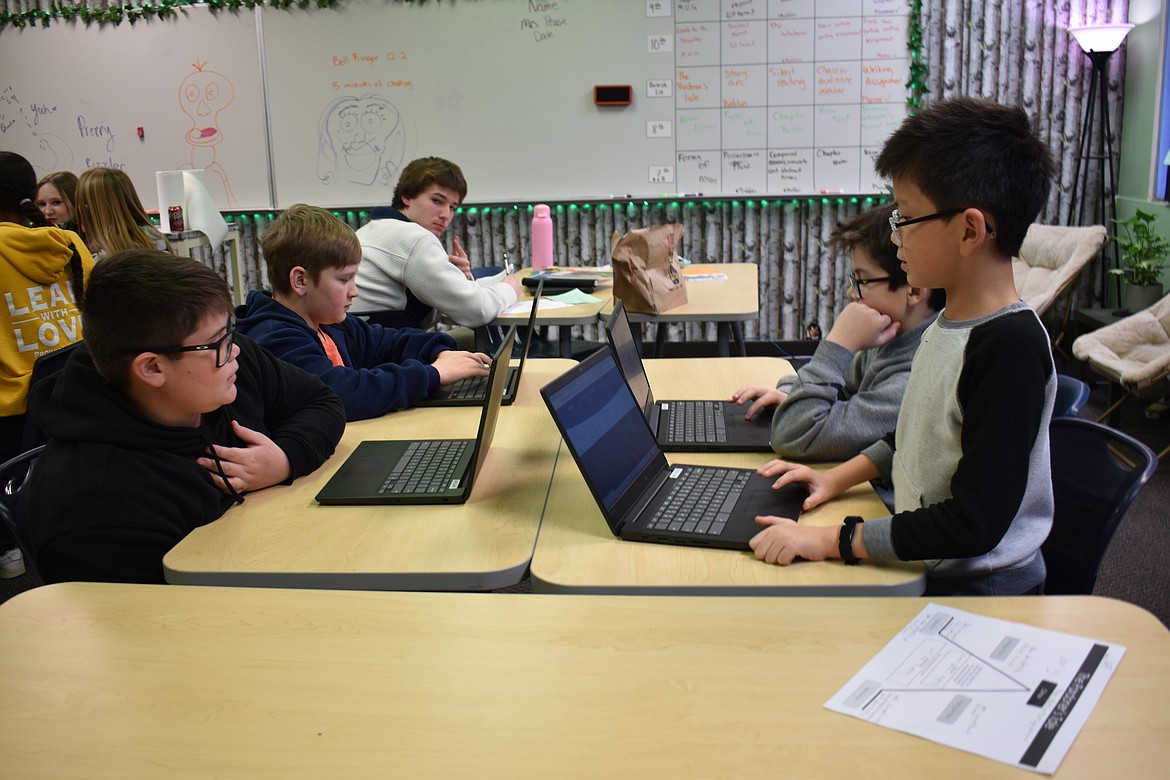 From left: Max Gerber, Oliver Tadema, Nash Weger and Josiah Stuart start honing their skills for the next Vocabulary Bowl, which starts in February.