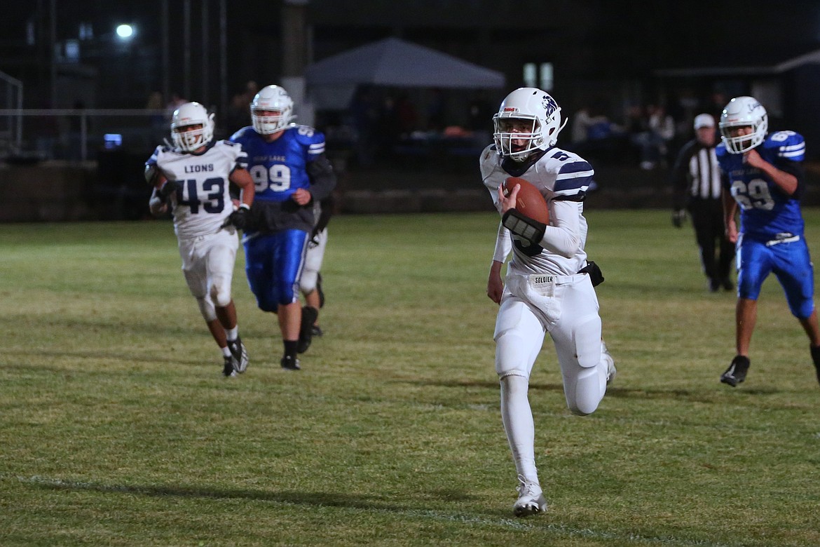 MLCA/CCS junior Johnny Ferguson runs down the field for a touchdown against Soap Lake. Ferguson was named to the first-team all-league list as an offensive all-purpose player and defensive back.