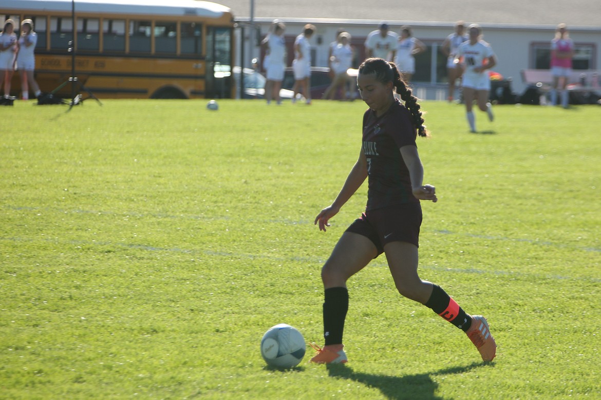 Wahluke senior Maria Barajas passes the ball to a teammate during a match against College Place. Barajas received first-team all-league honors.