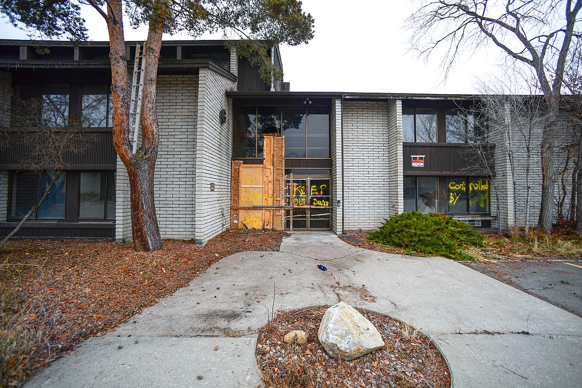 A boarded-up entrance at the former Fairbridge Inn & Suites and Outlaw Convention Center in Kalispell on Wednesday, Dec. 4. (Casey Kreider/Daily Inter Lake)