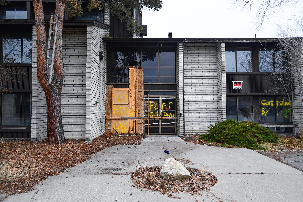 A boarded-up entrance at the former Fairbridge Inn & Suites and Outlaw Convention Center in Kalispell on Wednesday, Dec. 4. (Casey Kreider/Daily Inter Lake)