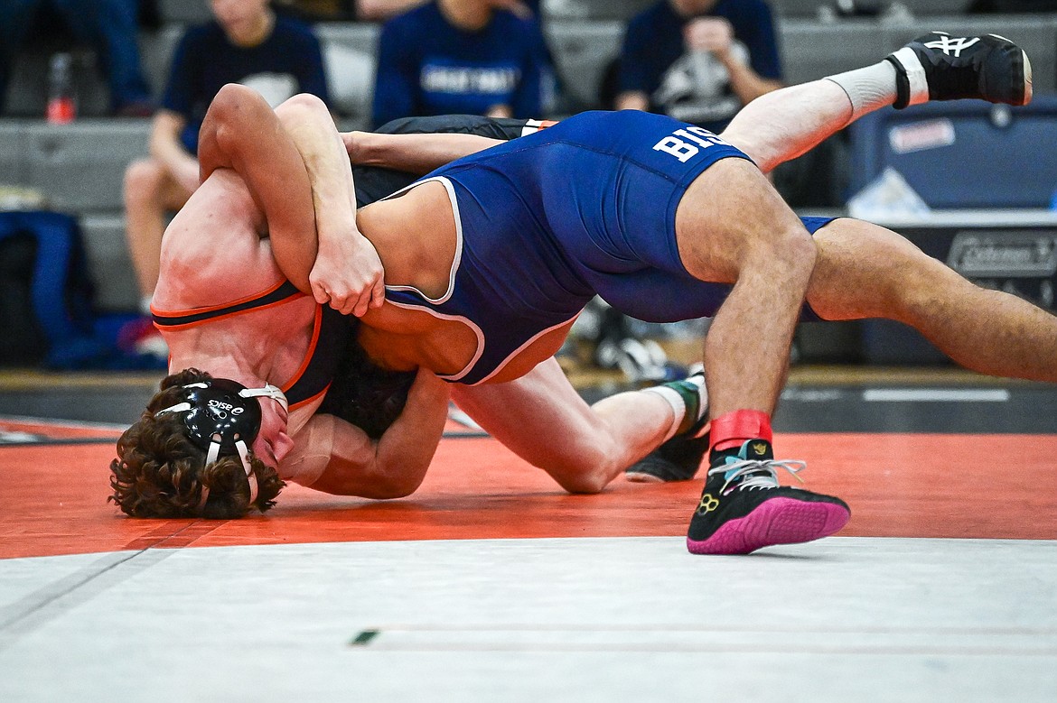 Flathead's Cliff Nance wrestles Great Falls' Darren Mitchell at 175 lbs. at Flathead High School on Saturday, Dec. 7. (Casey Kreider/Daily Inter Lake)