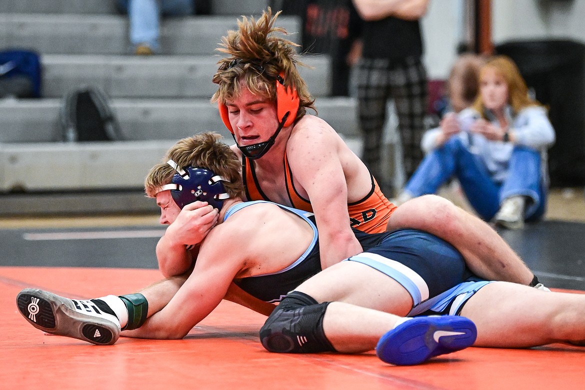 Flathead's Dennis Ward wrestles Great Falls' Kale Baumann at 157 lbs. at Flathead High School on Saturday, Dec. 7. (Casey Kreider/Daily Inter Lake)