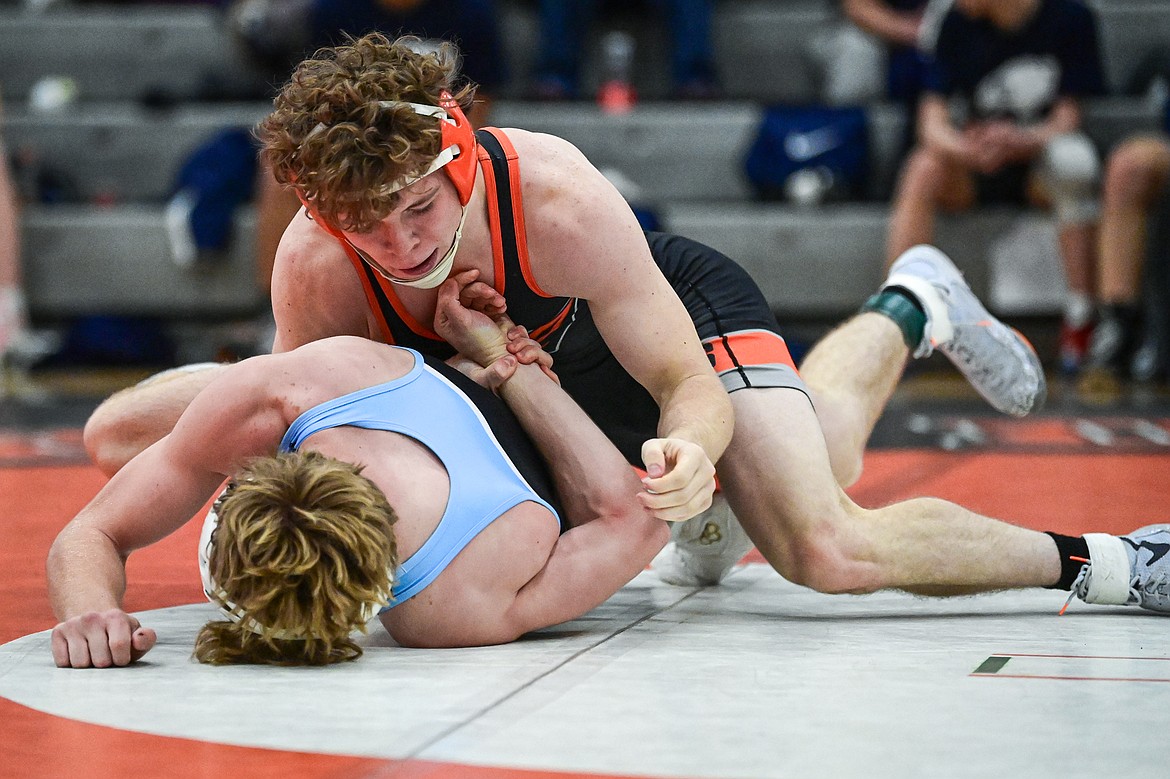 Flathead's Gannon Wisher wrestles Great Falls' Jace Komac at 150 lbs. at Flathead High School on Saturday, Dec. 7. (Casey Kreider/Daily Inter Lake)