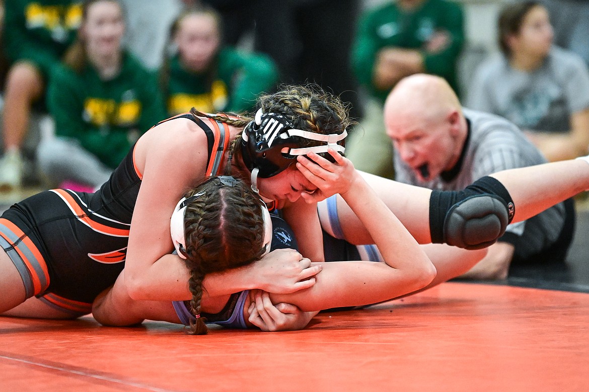 Flathead's Alisha Cook pins Great Falls' Layla Svingen at 145 lbs. at Flathead High School on Saturday, Dec. 7. (Casey Kreider/Daily Inter Lake)