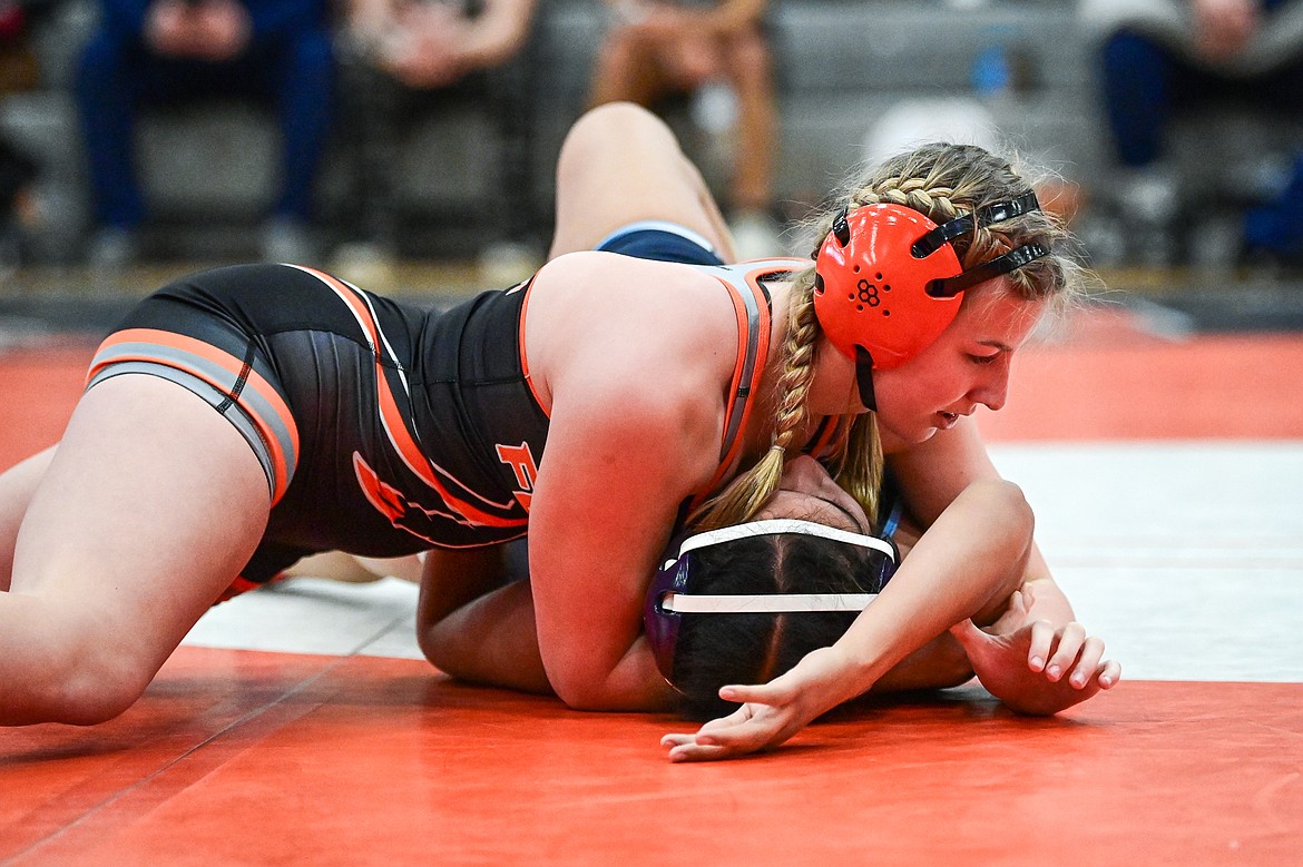 Flathead's Hailey Wilson pins Great Falls' Victoria Zender at 140 lbs. at Flathead High School on Saturday, Dec. 7. (Casey Kreider/Daily Inter Lake)