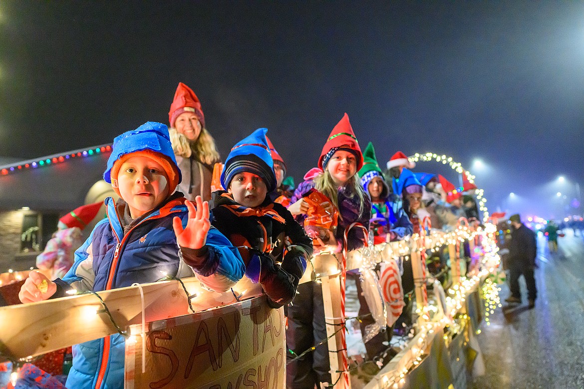 A float full of youngsters rides in the parade.