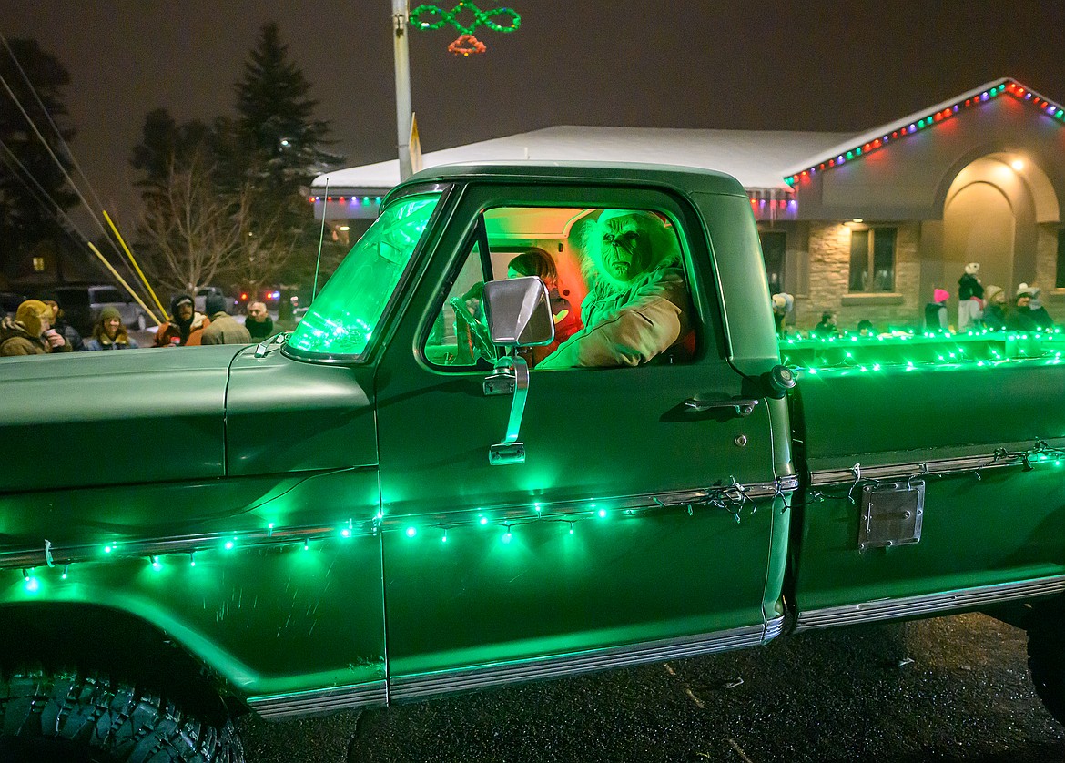 There were plenty of Grinches in this parade. This one even had a green truck.