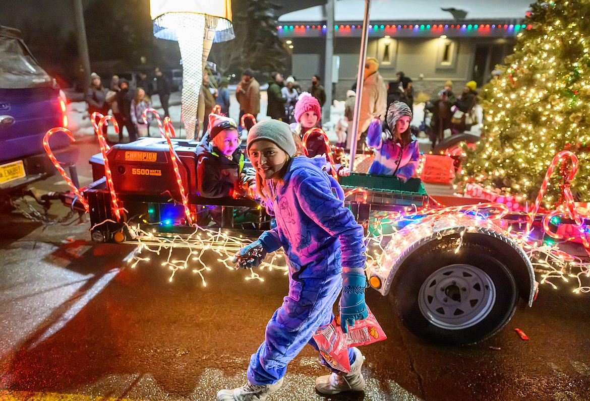 A Christmas Story float rolls through the parade.