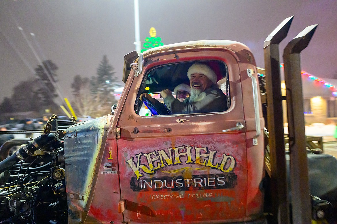 Kevin Kenfield rolls through the parade in his vintage rig.