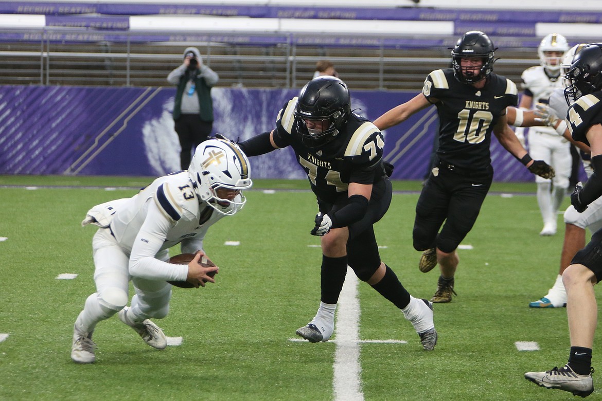 Royal sophomore Orlando Santillan (74) rushes in to secure a tackle during the first quarter against Seton Catholic on Friday.