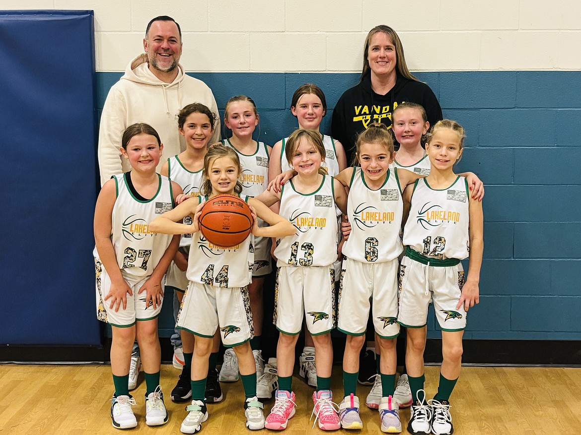 Courtesy photo
The Lakeland Elite fourth grade girls basketball team went undefeated and won the Post Falls Park and Rec Competitive League. In the front row from left are Aspen Reyes, Britney Wright, Makena Malone, Beckett Murphy and Izzy Caywood; back row from left, Cielle Ellis, Blaire Warren, Brooklynn Peed and Kamryn Young; and rear, coaches Will Murphy and Alli Nieman.