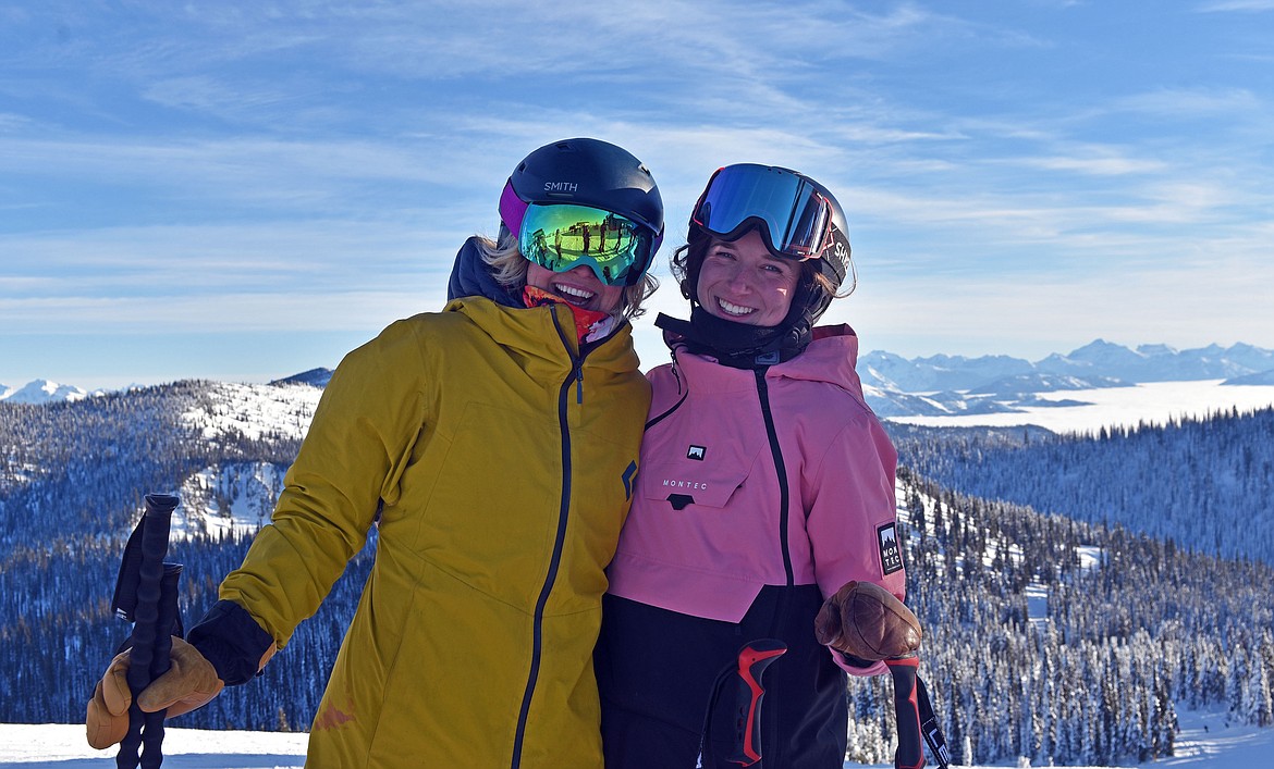 Whitefish Mountain Resort's snow reporter, Ella Kuzyk, skis with friend, Katie Brust, in an inversion on opening day. (Julie Engler/Whitefish Pilot)