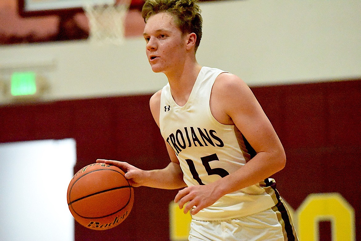 Troy junior Nolan Morris dribbles the ball during an intrasquad scrimmage Thursday, Dec. 5, 2024, at the Troy Activity Center. (Scott Shindledecker/The Western News)