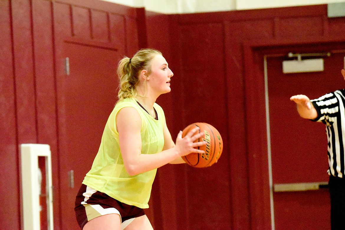 Troy senior basketball player Autumn Fisher prepares to inbound the ball during an intrasquad scrimmage Thursday, Dec. 5, 2024, at the Troy Activity Center. (Scott Shindledecker/The Western News)