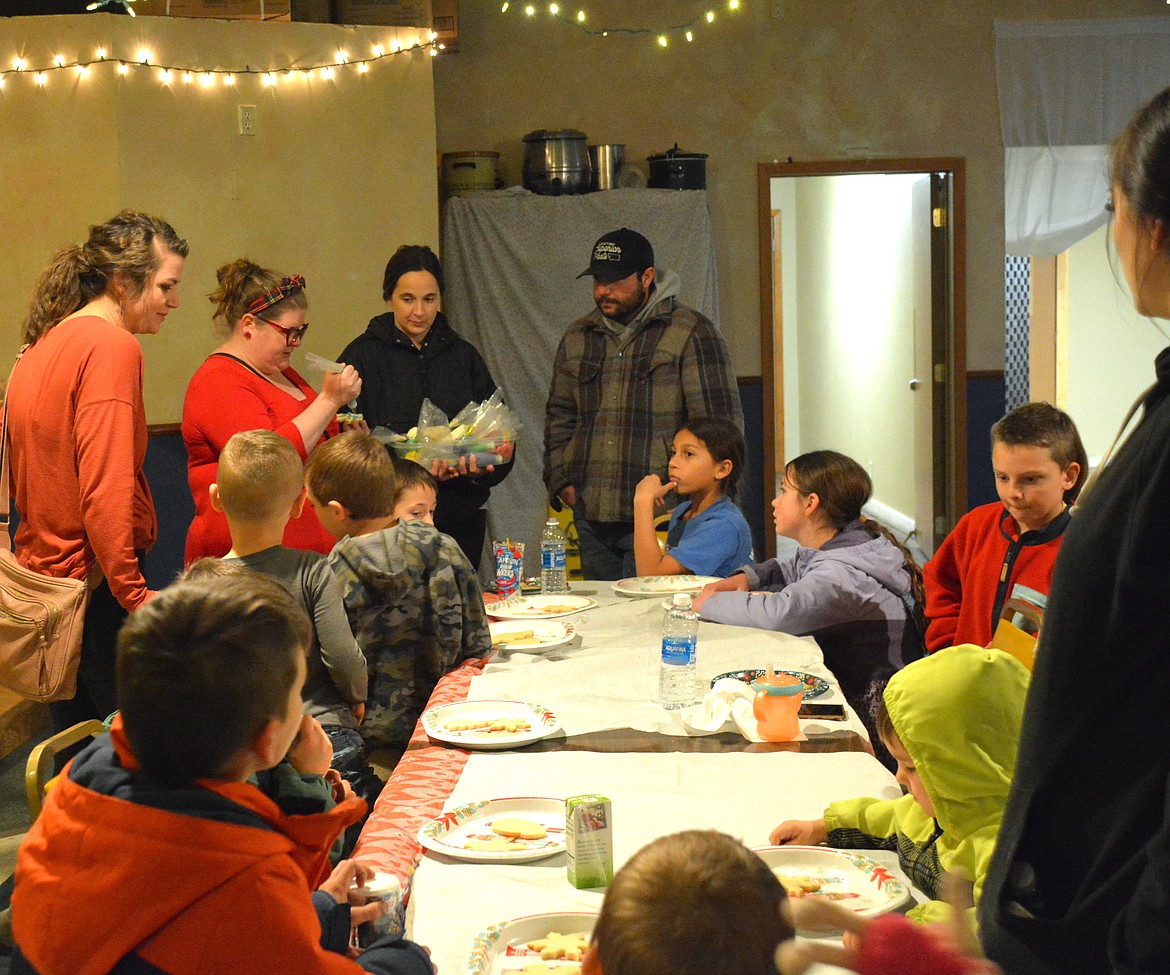 Jess Schaak provides some decorating tips to some very eager listeners on December 5, during the Christmas Cookie Frosting Party. (Amy Quinlivan)