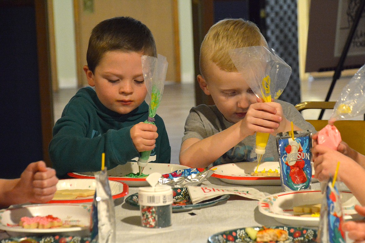 Frosting cookies is serious business. (Amy Quinlivan)