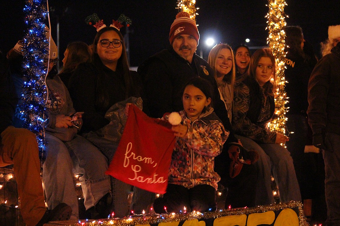 Ag parade participants enjoy the ride down Third Avenue.